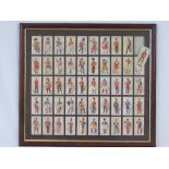 A collection of Players cigarette cards