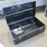 A large black painted metal travel trunk having drop end handles, 93 x 52 x 34cm.