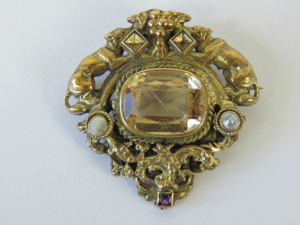 A delightful Victorian yellow metal brooch having central oval faceted citrine (approx 14 x 10mm),