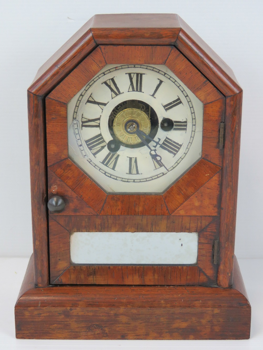 A late 19thC small American shelf clock by Seth Thomas, Thomaston, Connecticut, in a walnut case,