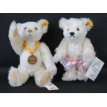 A Steiff Millennium Teddy bear, 32cm high, and another Tuesday's Bear, 26cm high.