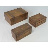 Three 19th century Tunbridge ware lidded boxes measuring 30, 23, and 22cm wide respectively.