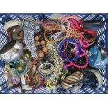 A large quantity of assorted modern and vintage costume jewellery including necklaces, bangles,