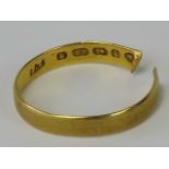 A 22ct gold band, cut a/f, hallmarked Birmingham, 1.57g.