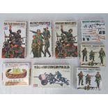 A quantity of Tamiya 1/35 'Military Miniatures' sets including German Infantry weapons,