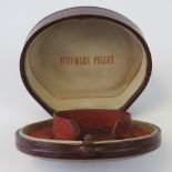An original vintage red leather Audemars Piguet presentation box.