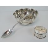 A HM silver bowl having fluted rim and gadrooned base,