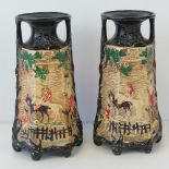 A pair of chalkware hunting themed relief vases c1930s, 26cm high.