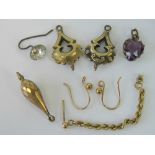 A pair of Victorian pinchbeck earrings (hangers deficient), a pinchbeck pendant,