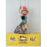 A Pelham puppet 'Old Lady' with bucket and mop complete with original box, box slightly a/f.