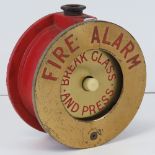 An industrial press button fire alarm, 12.5cm diameter.