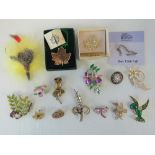 A quantity of assorted 20th century brooches including; Just the Right Club shoe,