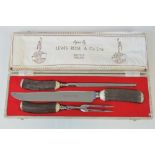 A quality three piece carving set by Lewis Rose & Co, with stag antler handles,