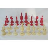 A Victorian turned and carved bone chess set,