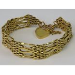 A 9ct gold bracelet having unusual articulated link patterns and a heart padlock clasp,