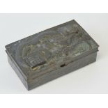 A white metal Chinese cigar box having embossed dragon design to lid and mountainous lakeside