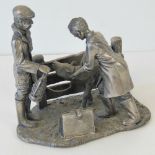 A heavy pewter figure group 'The Vetinary' from the Evergreen Studio Collection by John Ball,