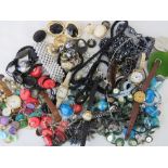 A quantity of assorted costume jewellery and watches.