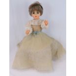 A contemporary plasticised jointed doll with sleepy eyes, possibly Italian,