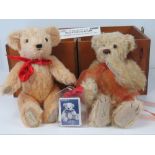 Two Dean's Millennium Teddy bears in golden mohair, 30cm high, and a wooden box.