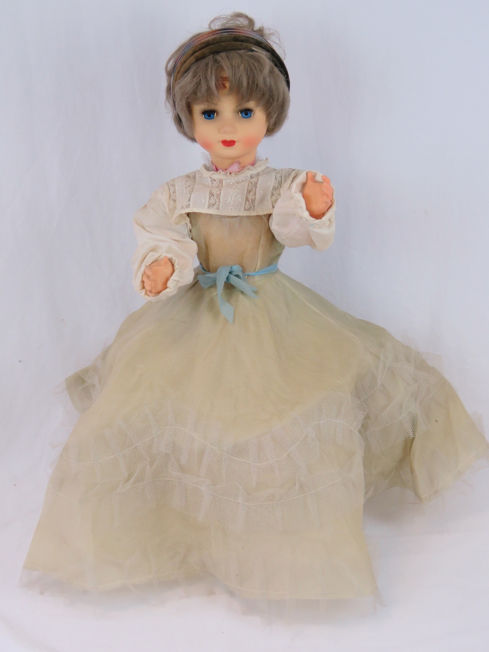 A contemporary plasticised jointed doll