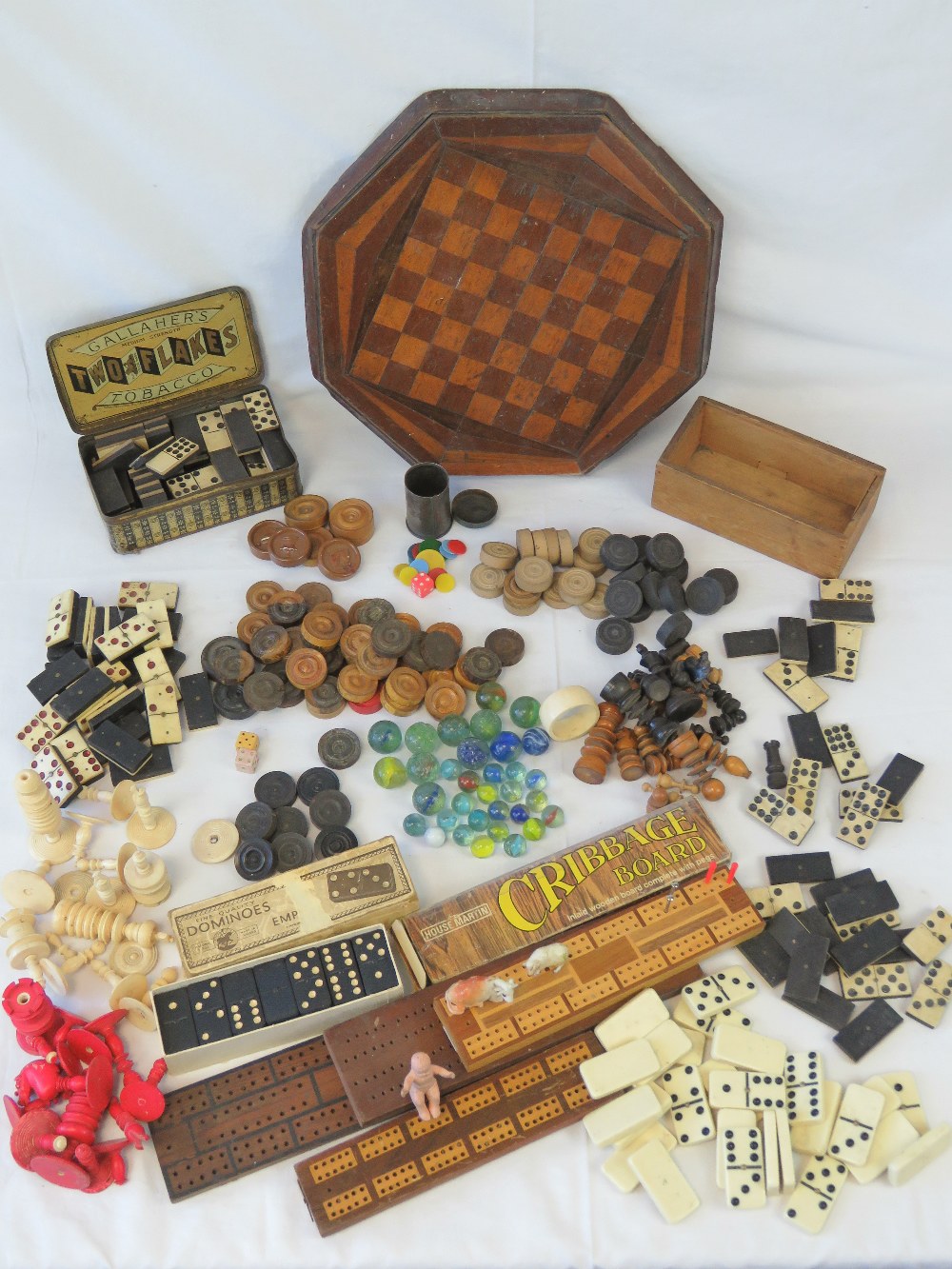 A large selection of vintage chess piece