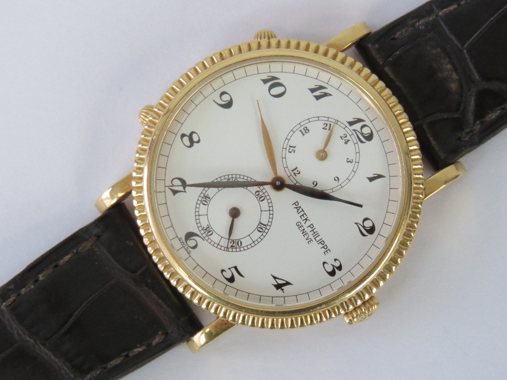 An 18ct gold Patek Philippe Travel Time