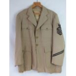 A US Navy Lightweight Officers dress tunic for a Gunnery Senior Chief Petty Officer with WWII