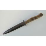 A WWI German fighting knife with wooden grip and metal scabbard, blade marked Ern Wald Rheinl.