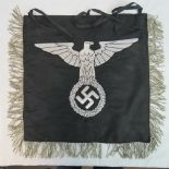 A reproduction WWII German SS trumpet banner with silver tassels and embroidered to both sides..