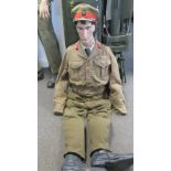 A WWII British military uniform for a Colonel with WWII ribbons and collar boards,