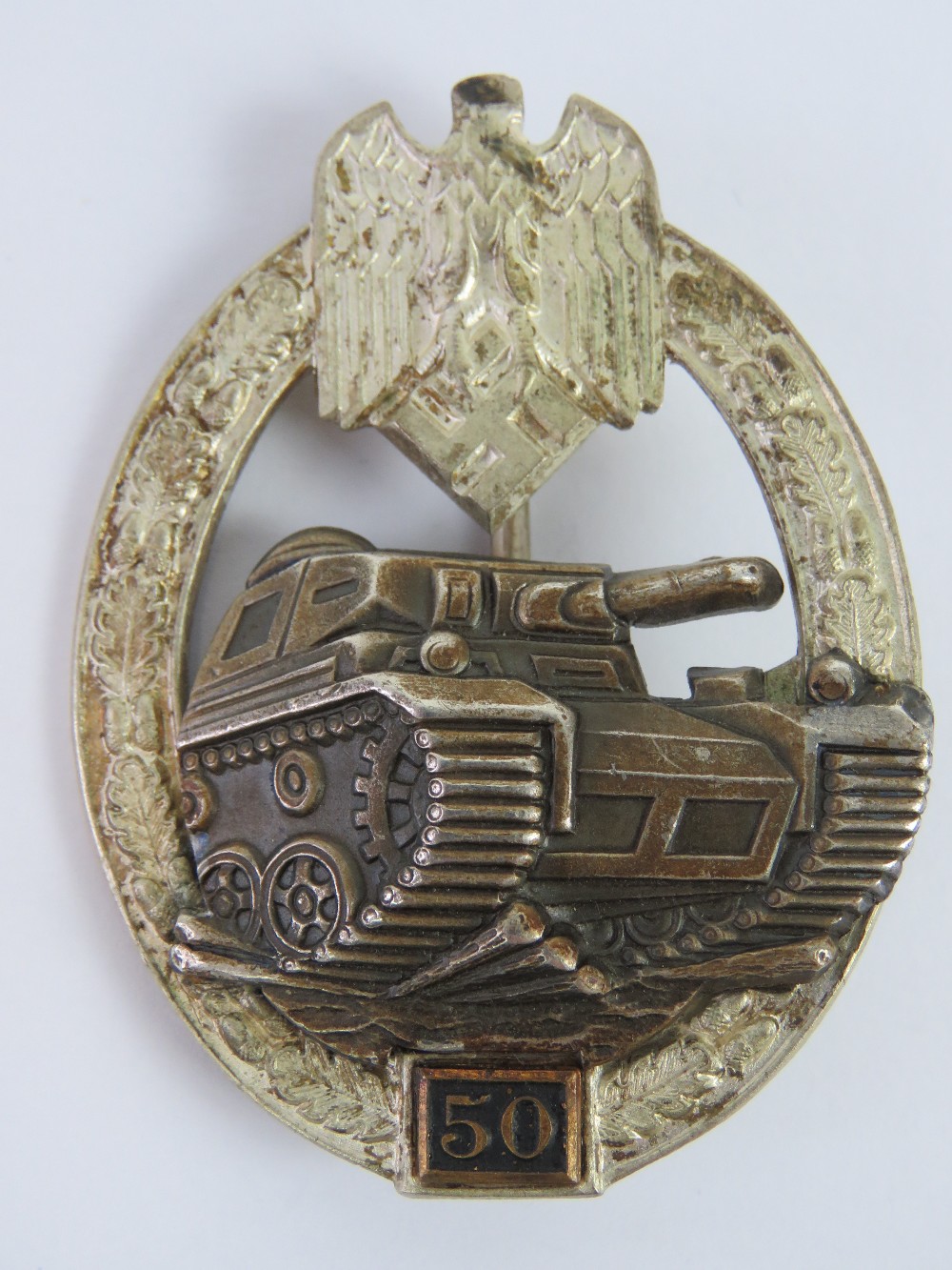 A WWII German 50 Panzer Tank Assault badge.