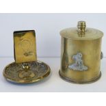Two pieces of trench art; a matchbox holder complete with repoussé smokers receptacle under,