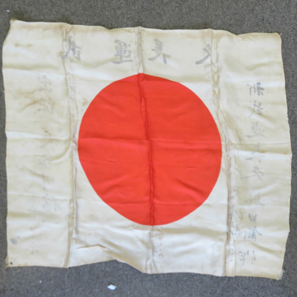 A WWII Japanese soldiers silk battle flag with shrine blessing marks.