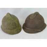 Two French Military helmets; one WWII Infantry with original liner and chin strap,