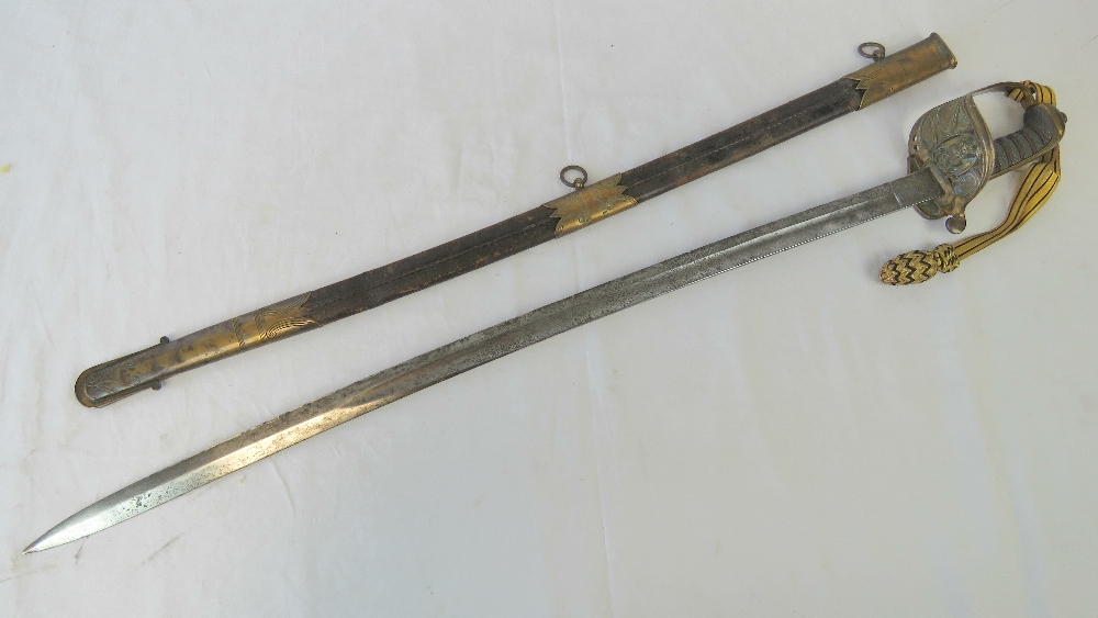 A Victorian naval sword having black and gilt thread portapee, leather scabbard with brass fittings, - Image 2 of 4