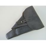 A WWII German Officers Walther P38 black leather pistol holster,