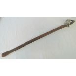A Victorian army sword having brass hilt with VR, engraving to both sides of the 81cm blade,