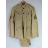A WWI US Infantry Officers summer tunic with trousers.