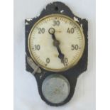 A WWII German army timer by Junghans, having brass case and mounted upon a wall plaque with bell,