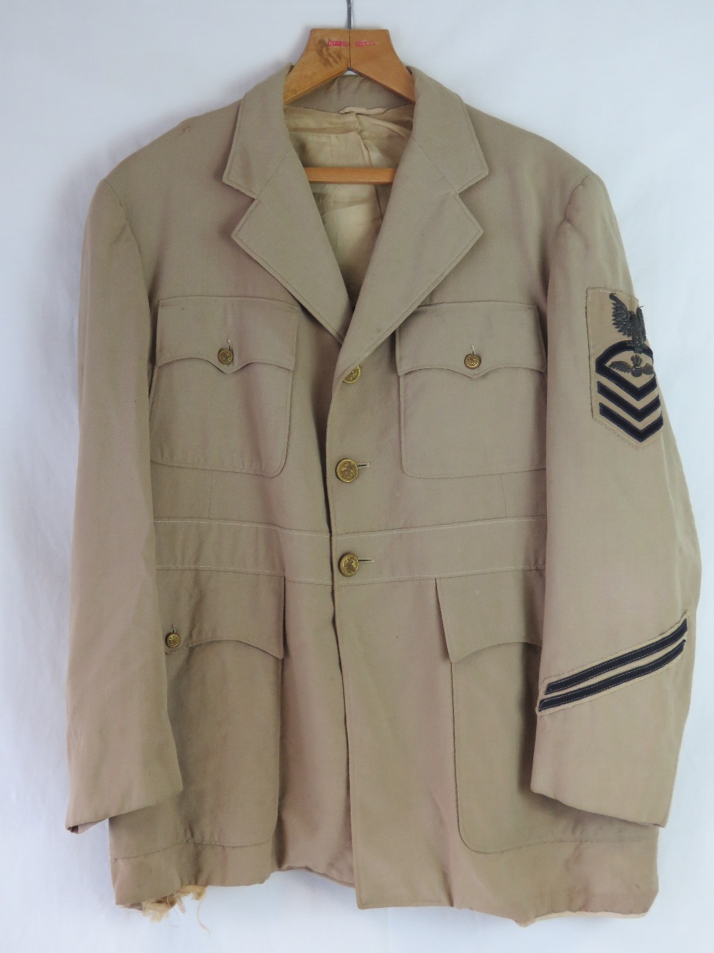 A US Navy Lightweight Officers dress tun