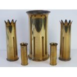 Trench art; two pairs of candle holders,