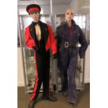 Two female mannequins in military unifor