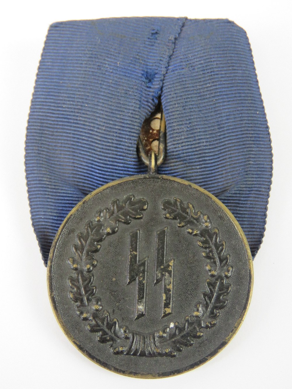 An SS 4 year Long Service medal, bearing