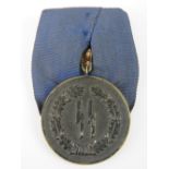 An SS 4 year Long Service medal, bearing