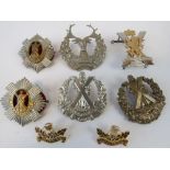 Eight Scottish military badges including