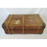 A vintage cabin trunk with canvas covering, leather corners and beech wood bindings, 85cm.