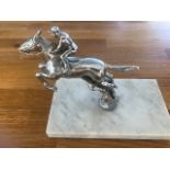 A chrome horse & jockey car mascot, probably by Lejeune, mounted on polished marble base, 13.