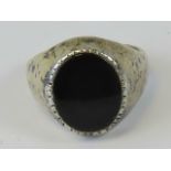 A silver and onyx signet ring, size k, stamped 925 silver.