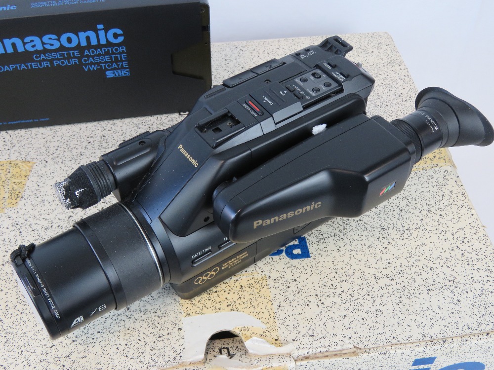 A Panasonic NV-G3B VHS movie camera and a GAF slide viewer, two items.